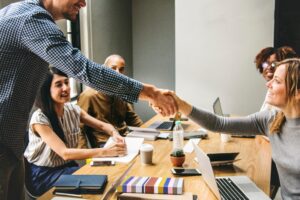 Colleagues shaking hands