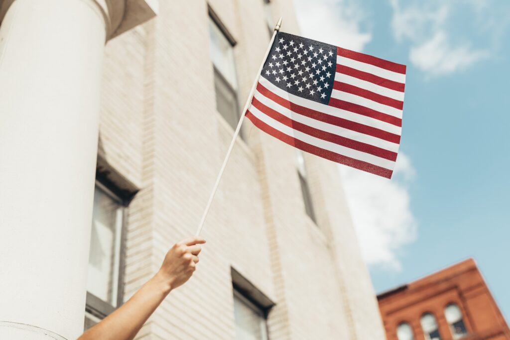 Hands holding the American flag