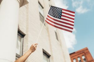 Hands holding the American flag