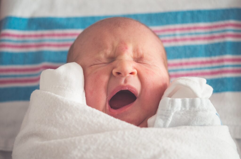 A baby yawning